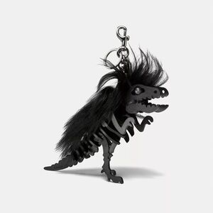 Coach Long Mohawk Rexy bag charm in black shearling and leather
